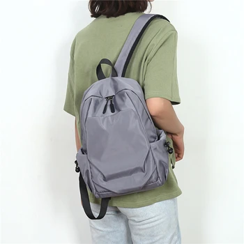 Мужской рюкзак Модная однотонная сумка на молнии для мужчин Дизайнерские водонепроницаемые мужские рюкзаки для путешествий